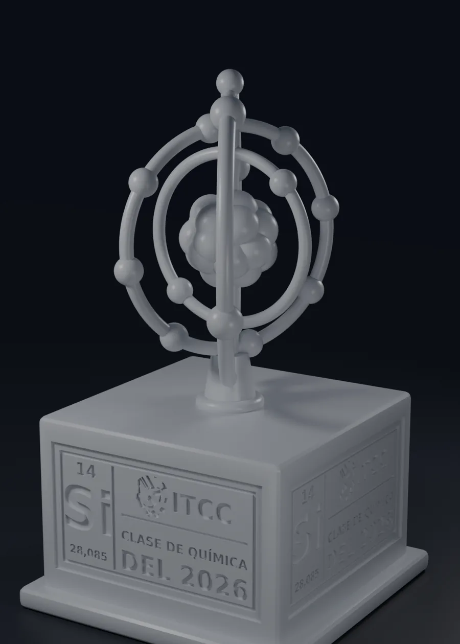 Render del premio: átomo de silicio sobre una base con la inscripción grabada